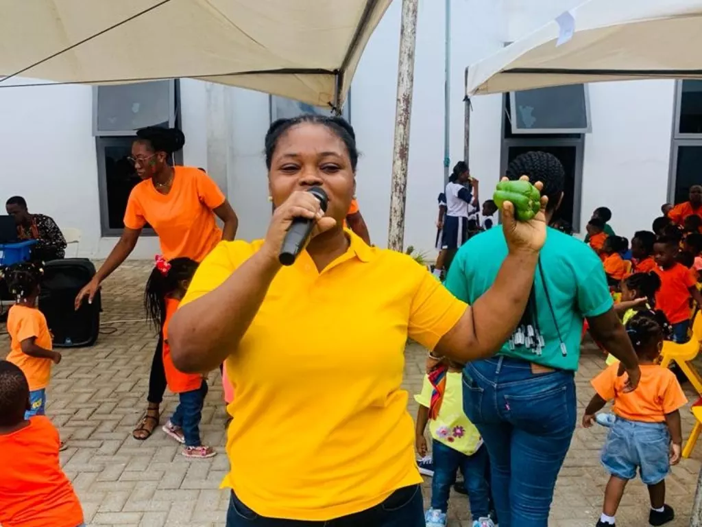 Pupil Teacher having an activity time