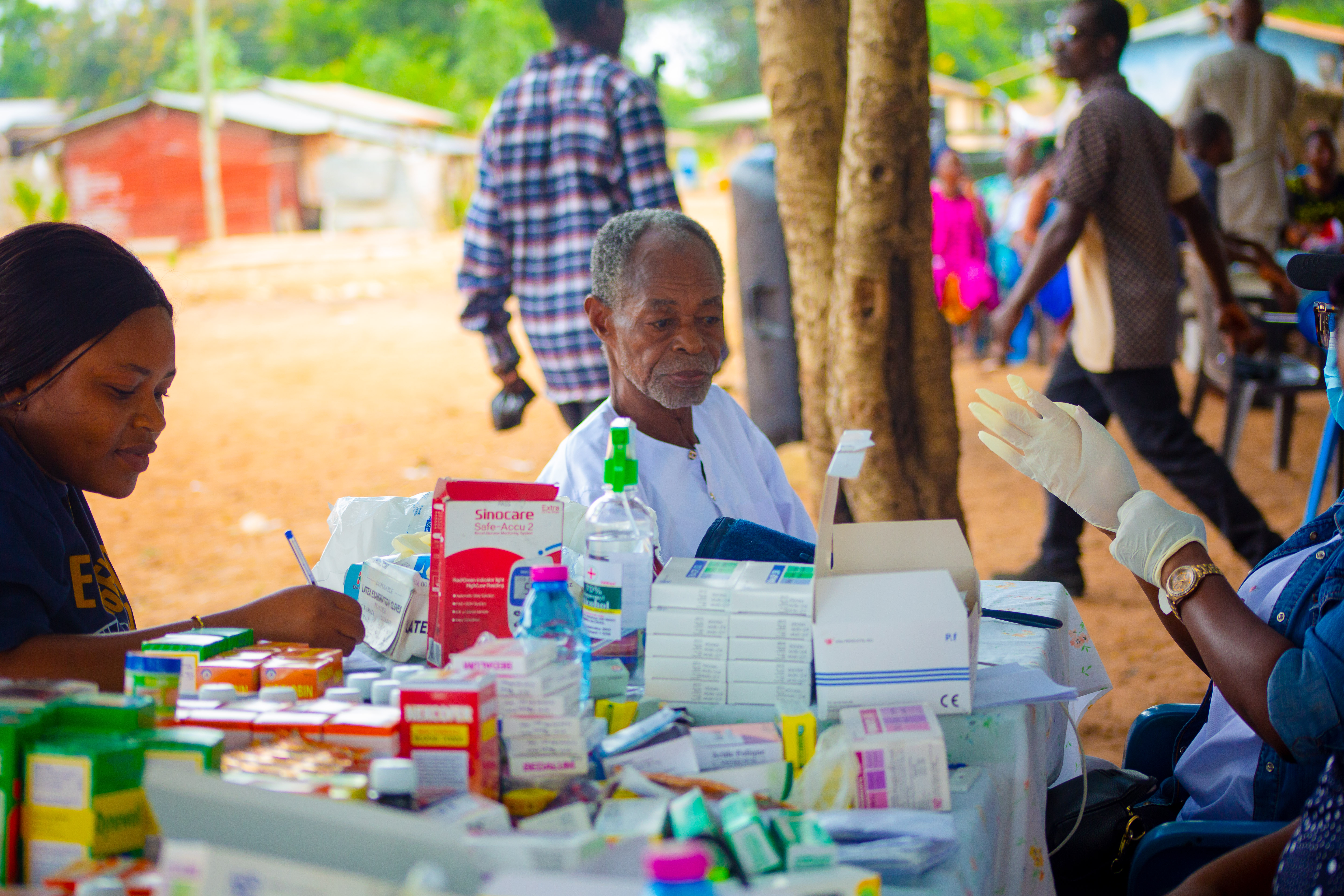 Health professionals engaging community members before screening