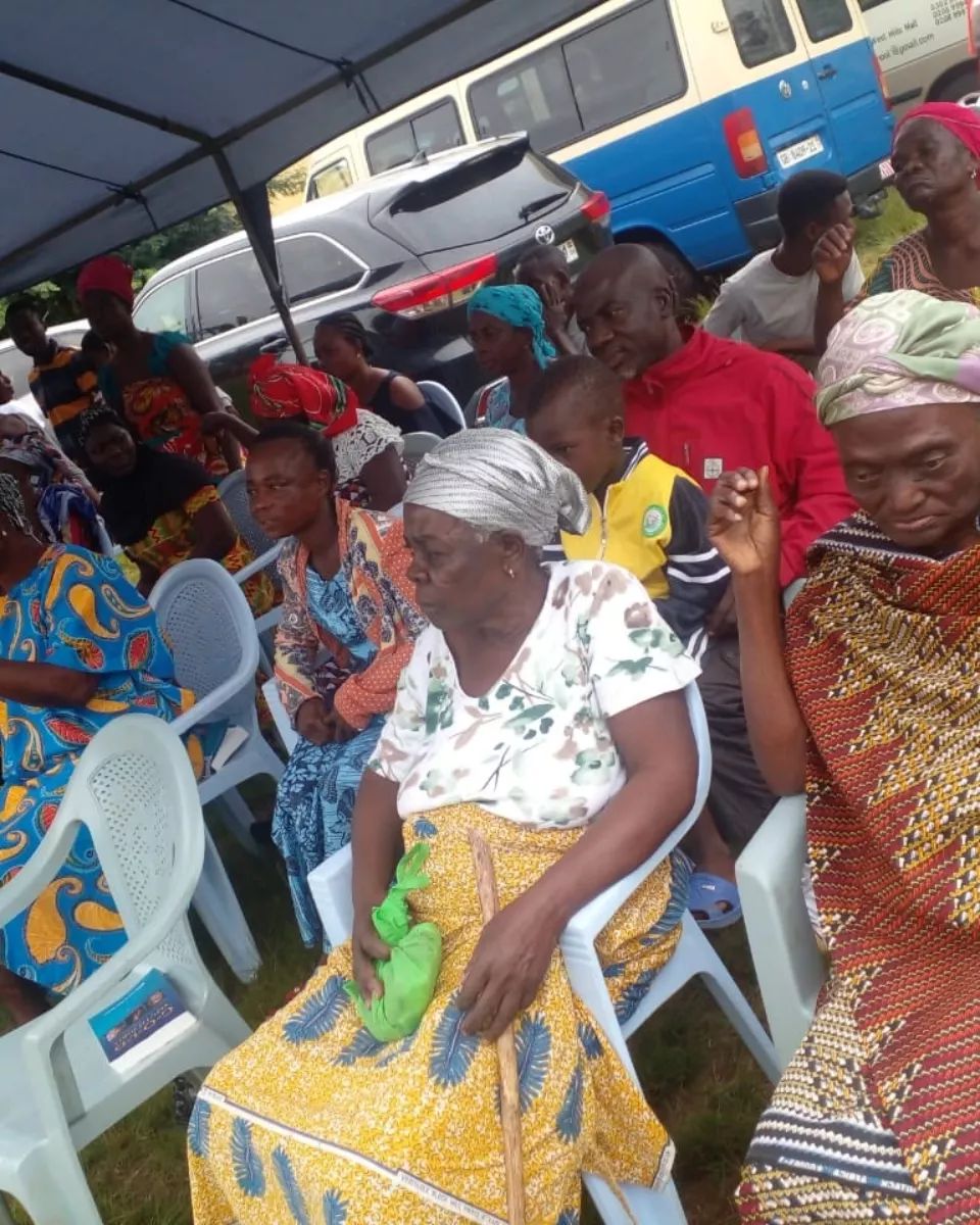 Community members seated during session