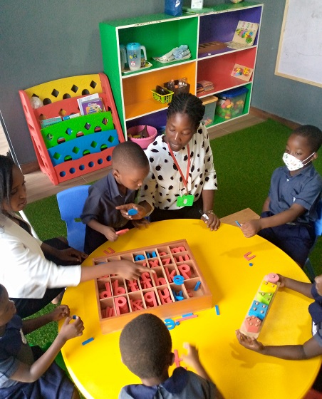 Teacher outlining instructions on circle time activity